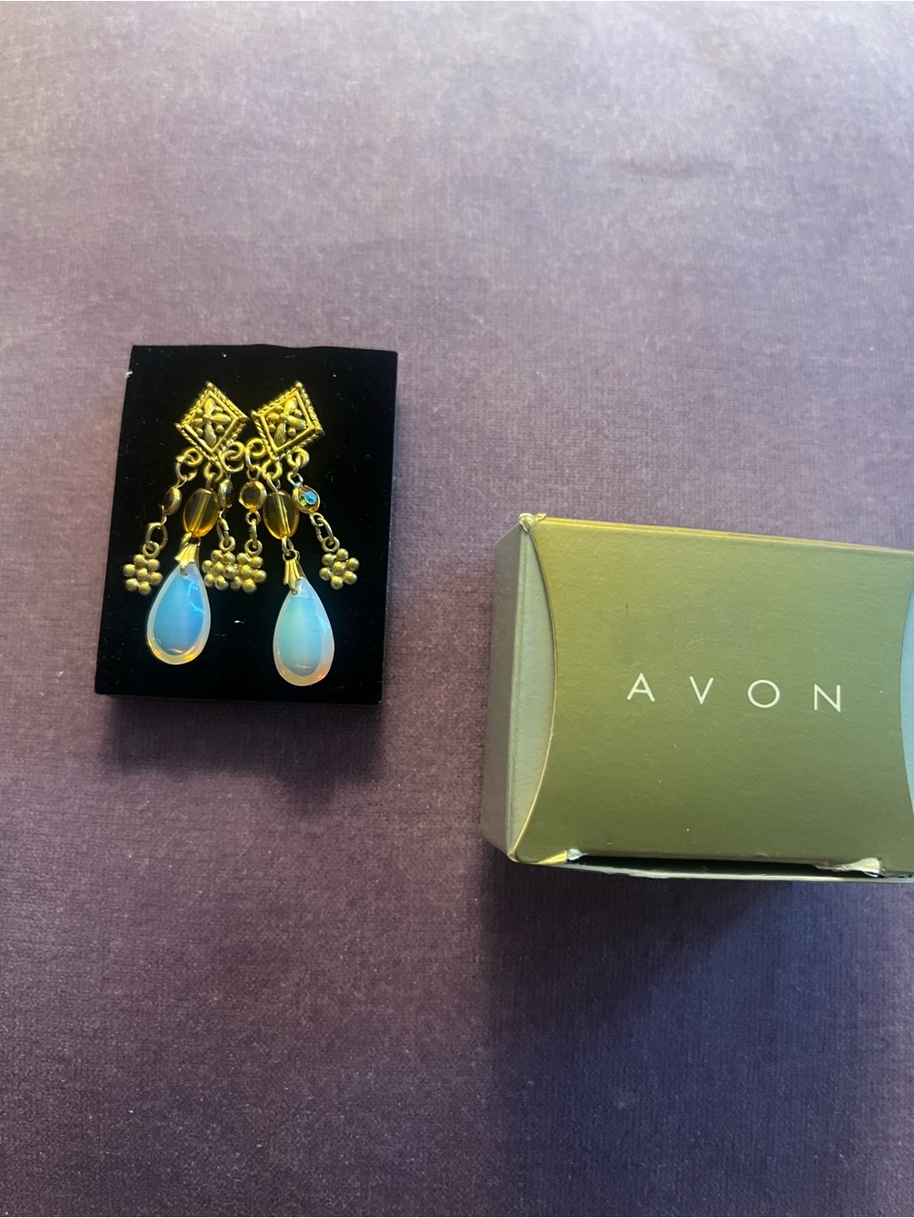 Avon Gold-Tone Blue Opalescent Teardrop Dangle Earrings with Charm Clusters